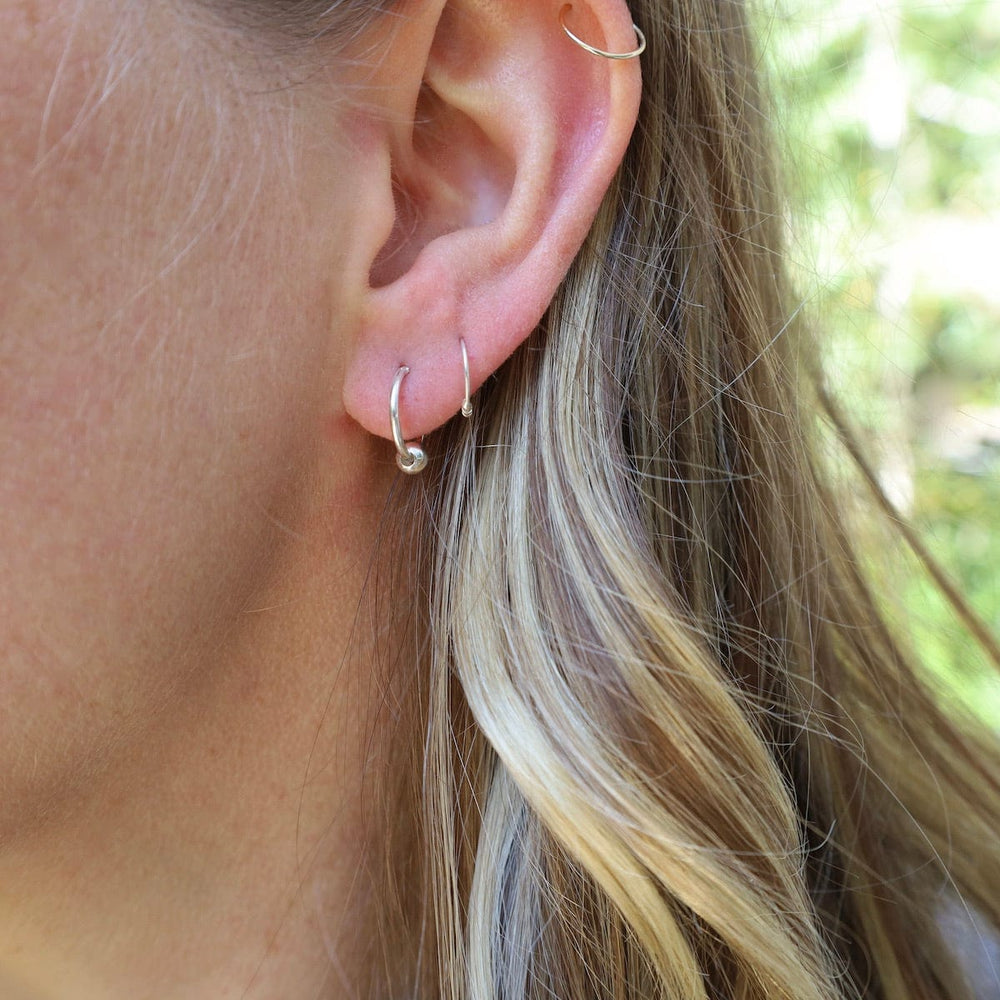 
                  
                    EAR 10mm Silver Sleeper Hoops with Coil
                  
                