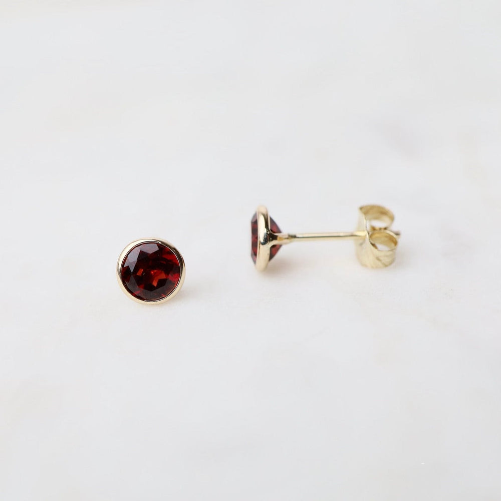 
                  
                    EAR-14K 14k Garnet Bezel Studs
                  
                