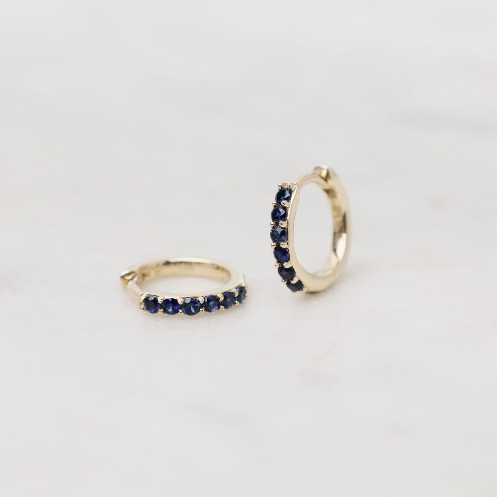 
                      
                        EAR-14K 14k Gold Blue Sapphire Huggies
                      
                    