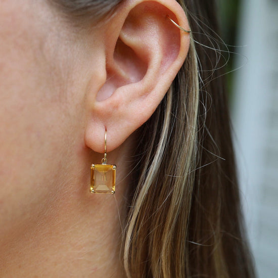EAR-14K 14K Gold Earrings with Small Emerald Cut Citrine in Prongs