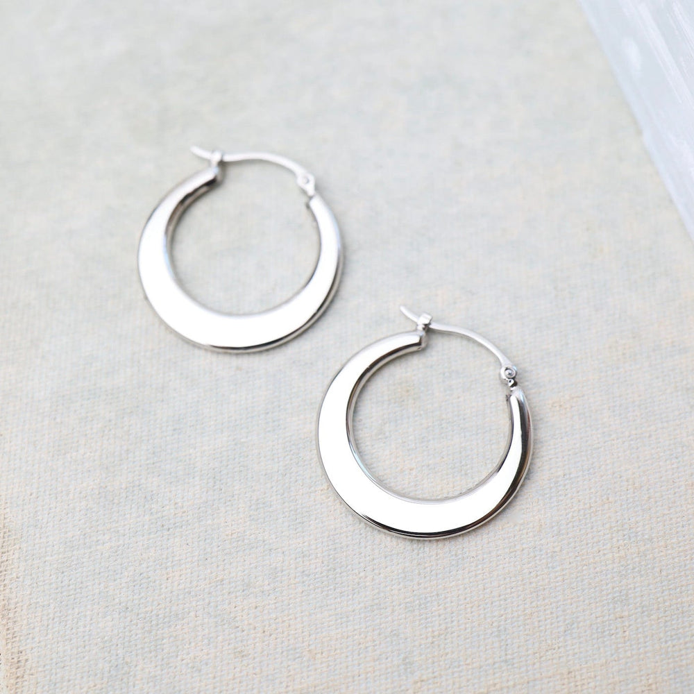 
                      
                        EAR-14K 14k White Gold Small Flat Crescent Hoops
                      
                    