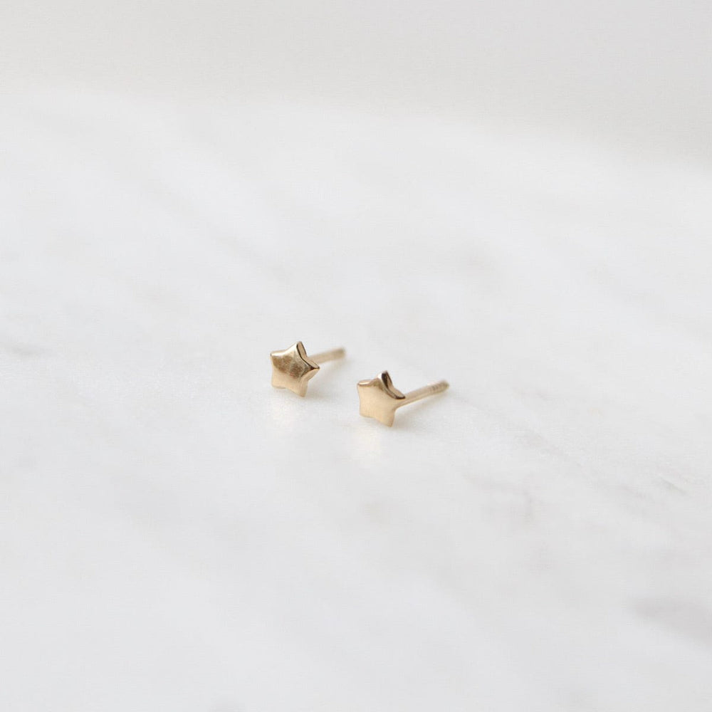 
                      
                        EAR-14K 14k Yellow Gold Super Mini Star Post Earring
                      
                    