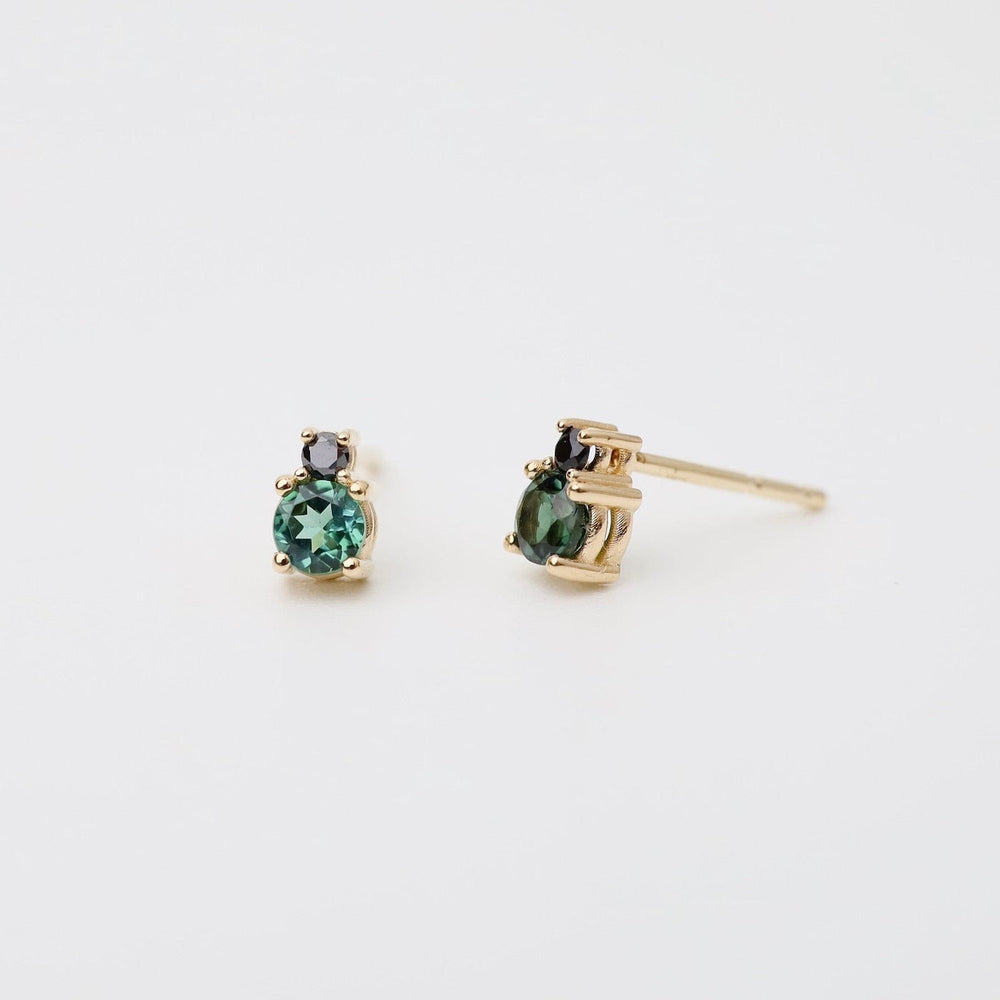 
                      
                        EAR-14K Black Diamond Green Tourmaline Linga Studs
                      
                    