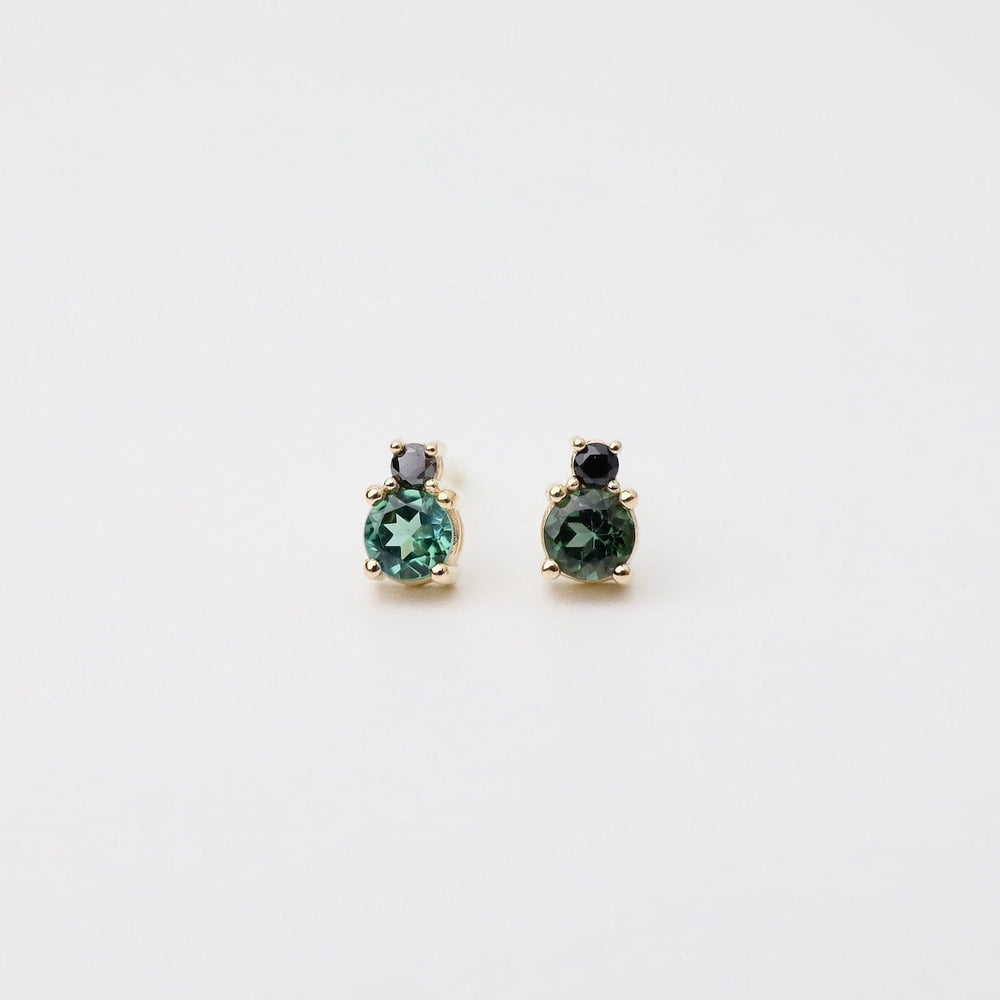 
                      
                        EAR-14K Black Diamond Green Tourmaline Linga Studs
                      
                    