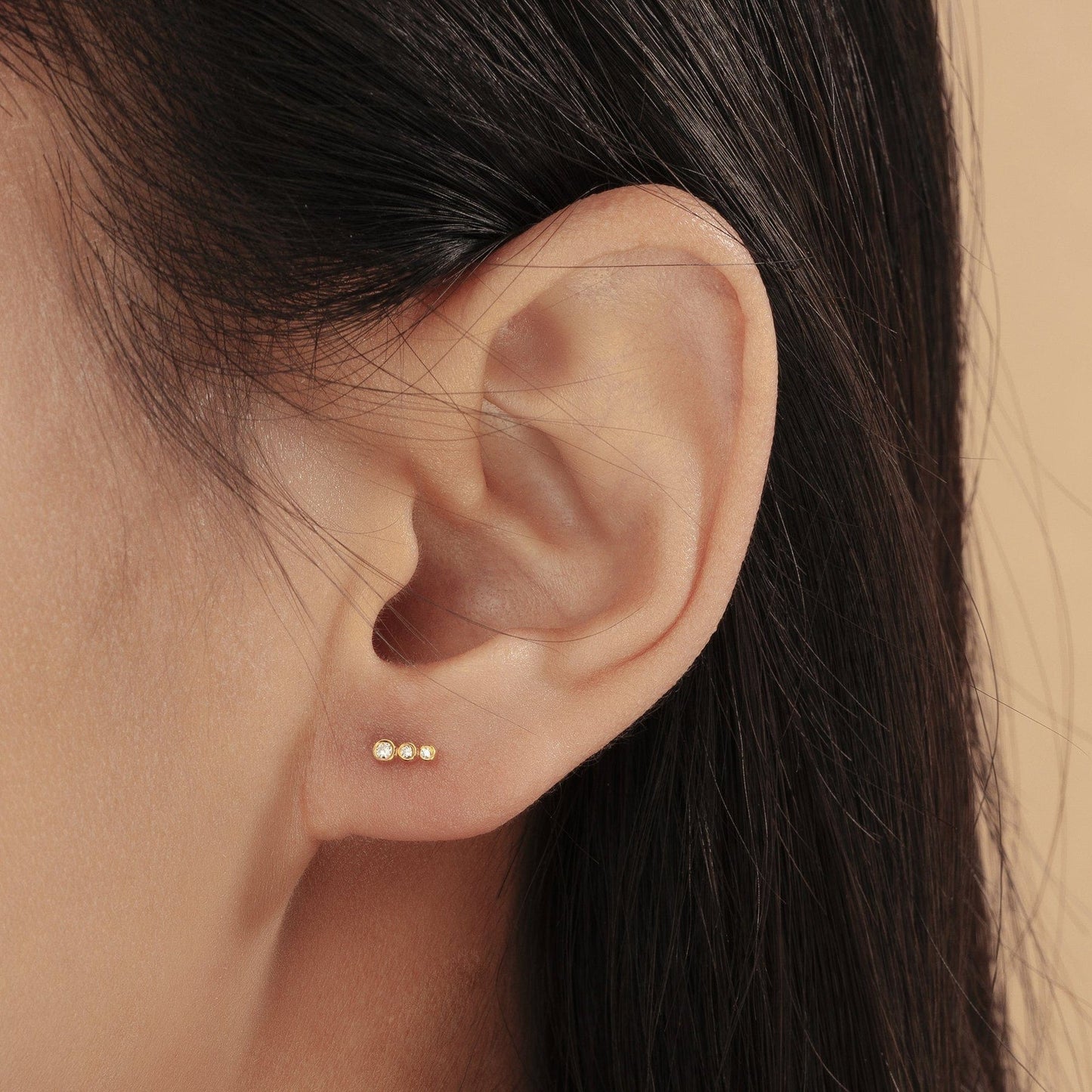EAR-14K Graduated Bezel Diamond Stud Earrings