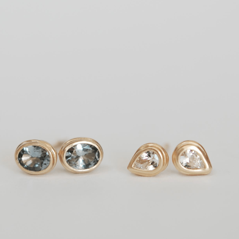 
                      
                        EAR-14K White Sapphire Studs
                      
                    