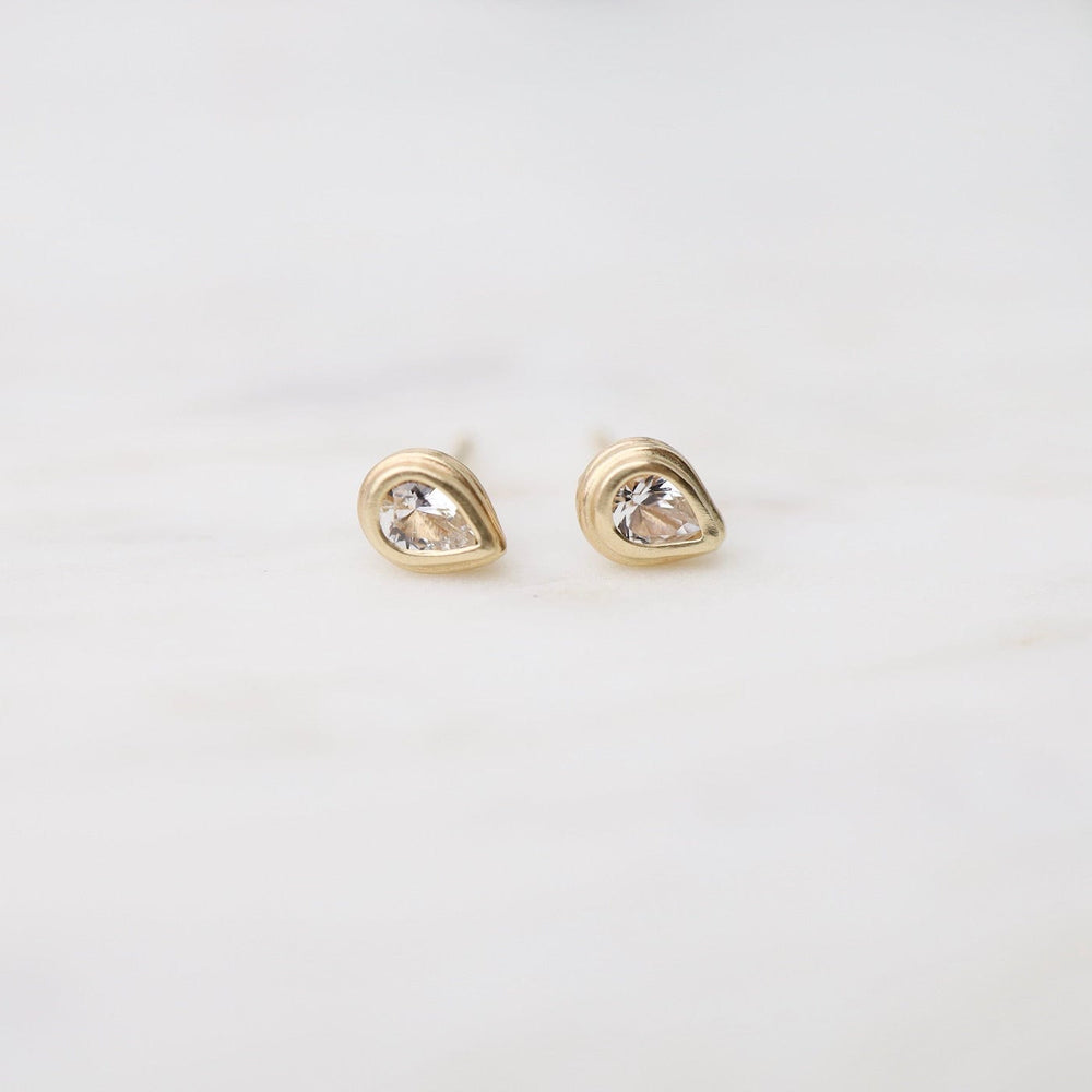 
                      
                        EAR-14K White Sapphire Studs
                      
                    