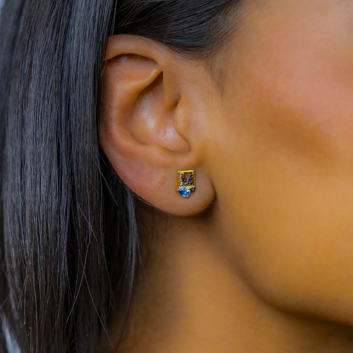 EAR-18K Ceres Studs - 18k Yellow Gold Blue Sapphire Teardrop with Black Diamonds