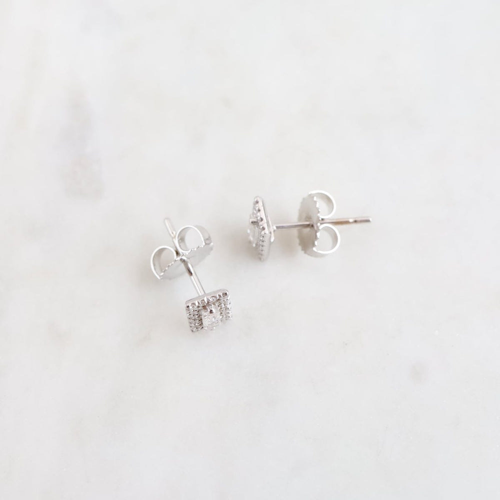 
                      
                        EAR-18K Classic Emerald Cut Diamond Studs
                      
                    