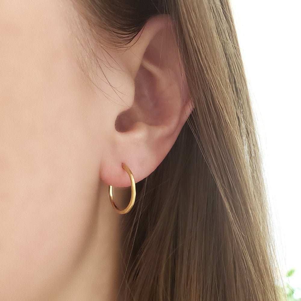 
                      
                        EAR-18K Small Hammered Open Hoop Earrings
                      
                    