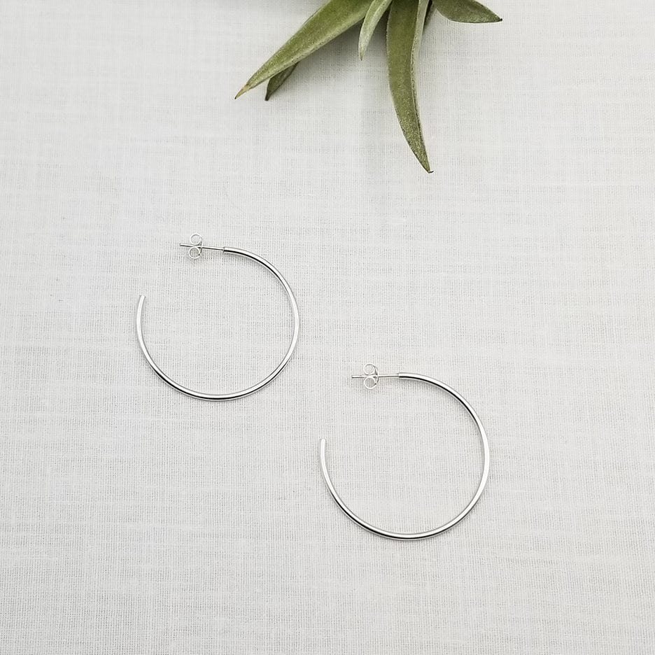 
                  
                    EAR 20mm STERLING SILVER HOOP
                  
                