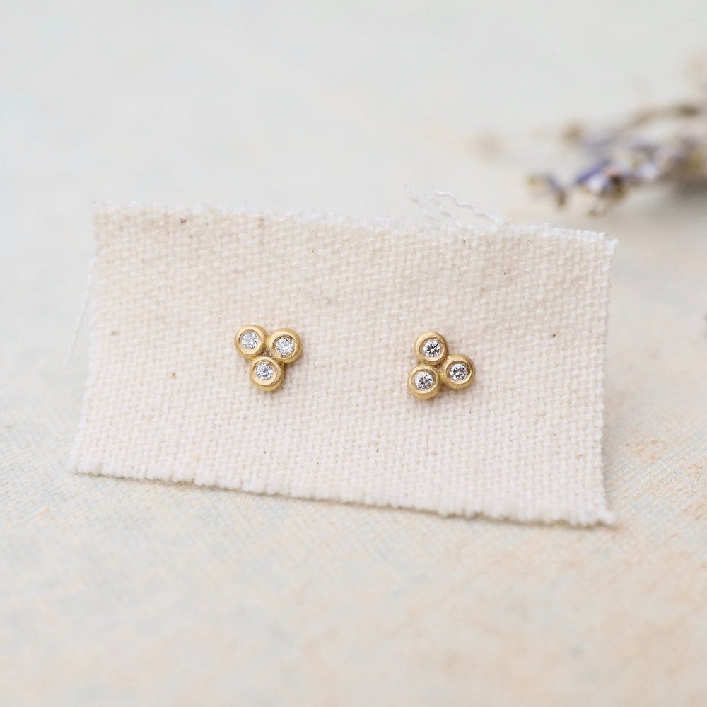 
                  
                    EAR-22K Trio Charm Diamond Stud Earrings
                  
                