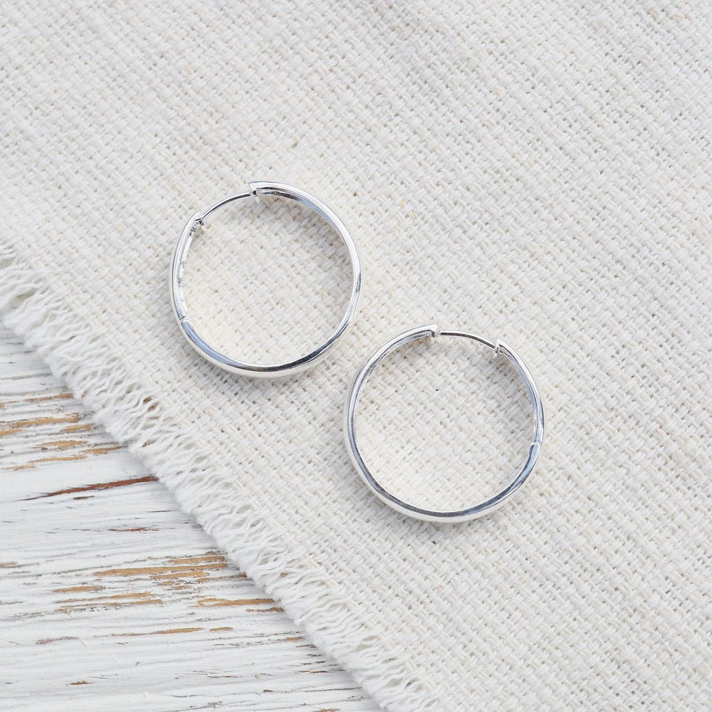 
                      
                        EAR 25mm Perfect Click Huggie Hoop - Sterling Silver
                      
                    