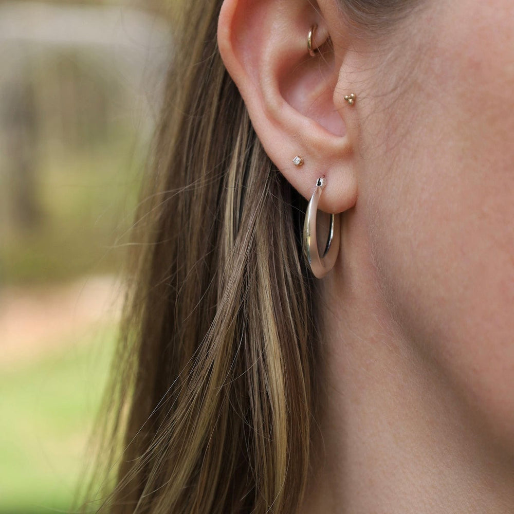 
                      
                        EAR 25mm Triangle Click Hoops
                      
                    