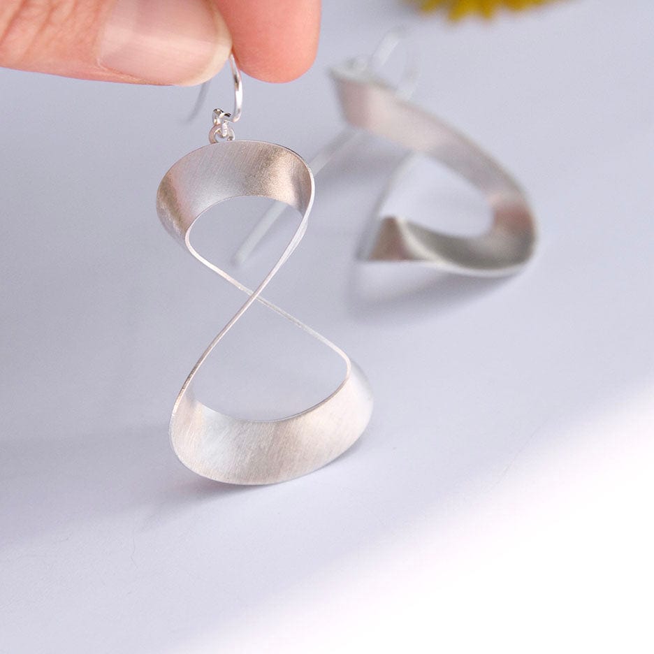 
                      
                        EAR 3D Ribbon Earring
                      
                    