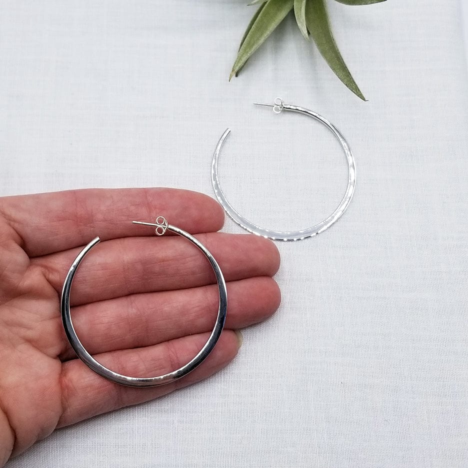 
                      
                        EAR 50mm STERLING SILVER TAPERED HOOP
                      
                    