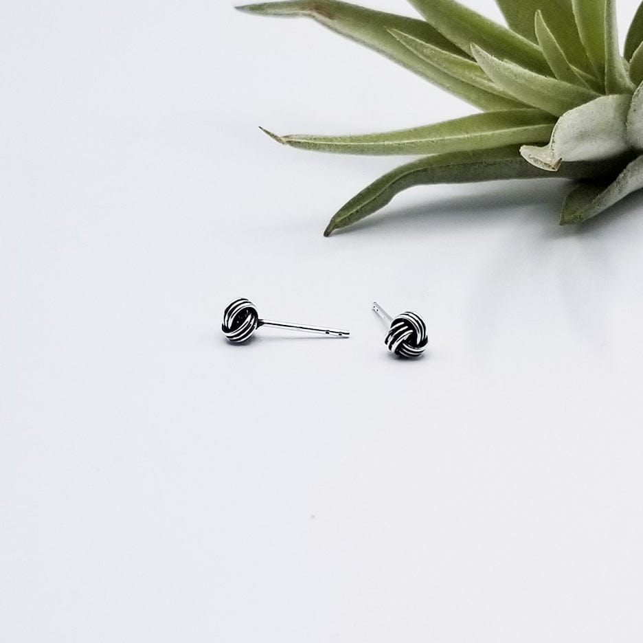 
                      
                        EAR 6mm OXIDIZED STERLING SILVER KNOT
                      
                    