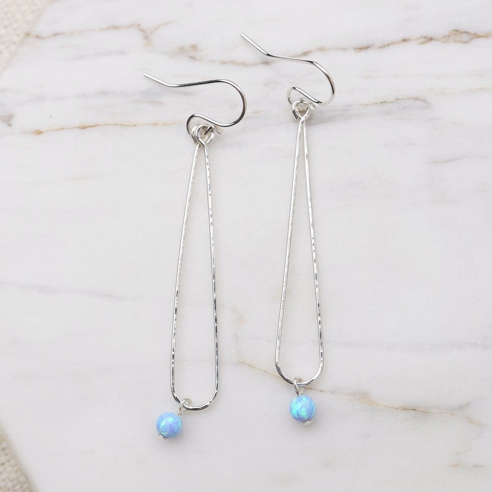 
                  
                    EAR Blue Opal Ball on Elongated Hammered Dew Drop - St
                  
                