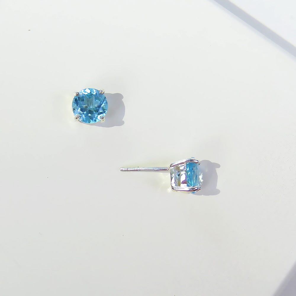 EAR BLUE TOPAZ ROUND POST