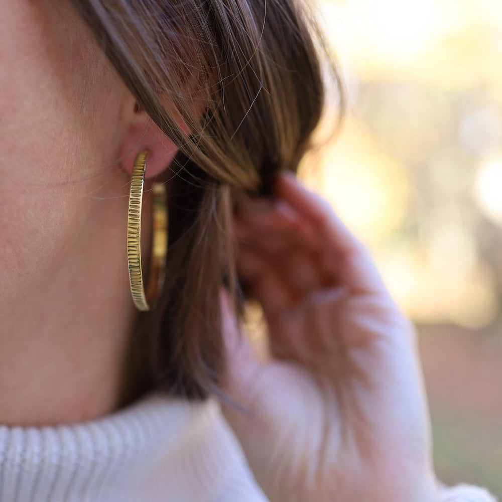 
                  
                    EAR-BRASS Textured Solid Brass Hoop
                  
                