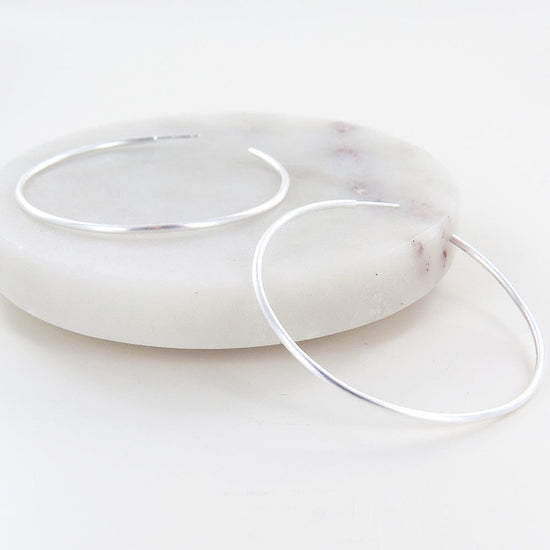 Load image into Gallery viewer, EAR BRUSHED STERLING SILVER 50MM TUBE HOOP
