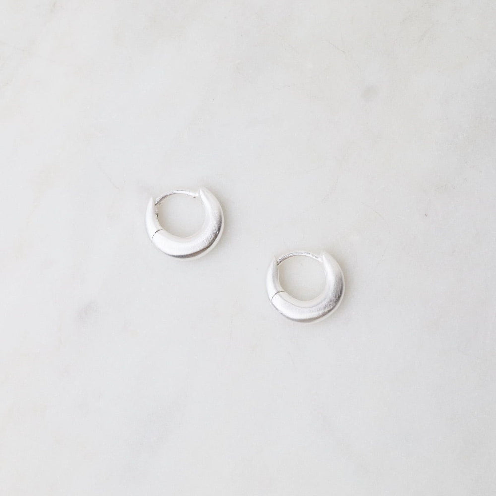 
                  
                    EAR Brushed Sterling Silver Tiny Crescent Click Huggie Hoops
                  
                