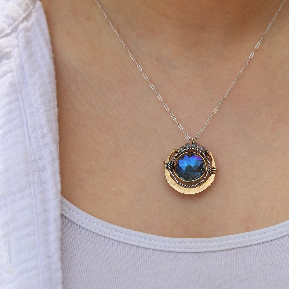 
                      
                        EAR Crystal Sphere Necklace
                      
                    