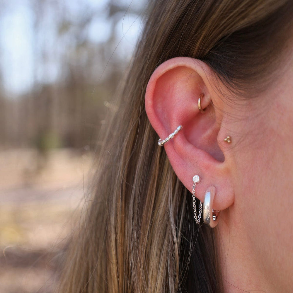 
                  
                    EAR-CUFF Sterling Silver Oval Beaded Ear Cuff
                  
                