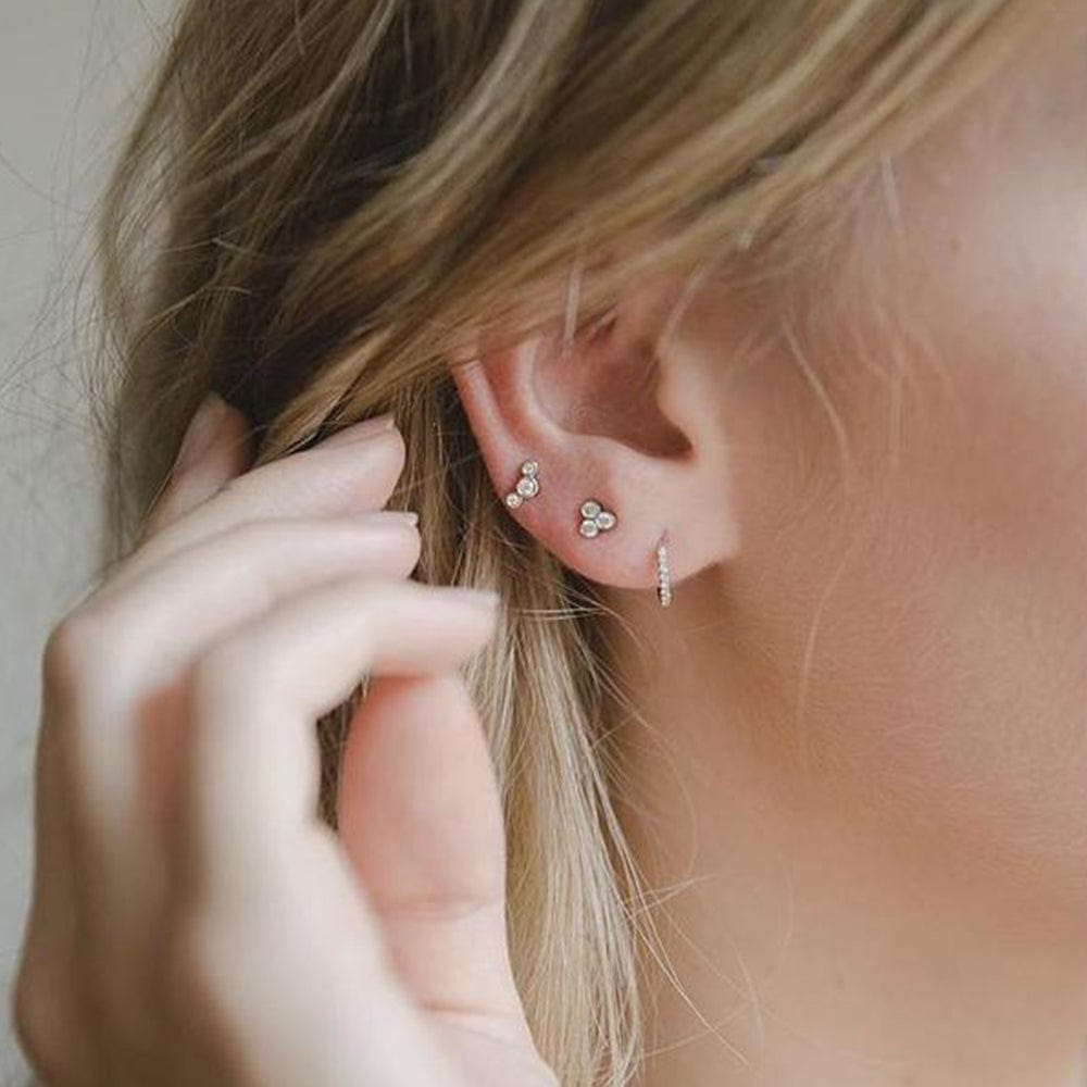 EAR-DIA 14K GOLD CURVED SMALL 3 DIAMOND STUD EARRINGS