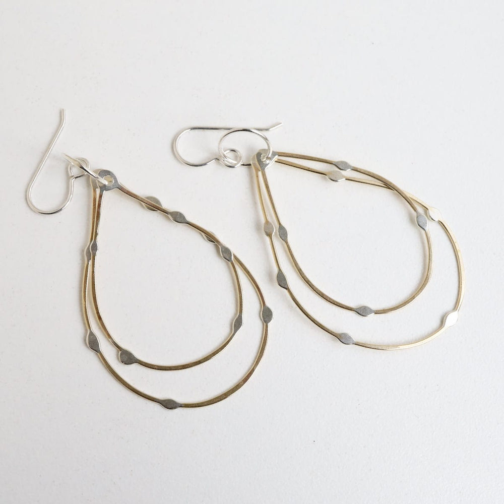 
                      
                        EAR Dotted Teardrop Hoops
                      
                    