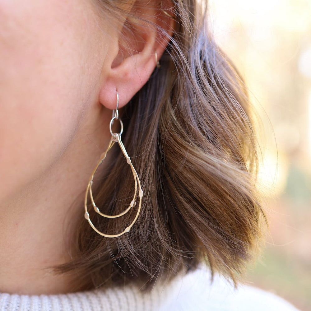 
                      
                        EAR Dotted Teardrop Hoops
                      
                    