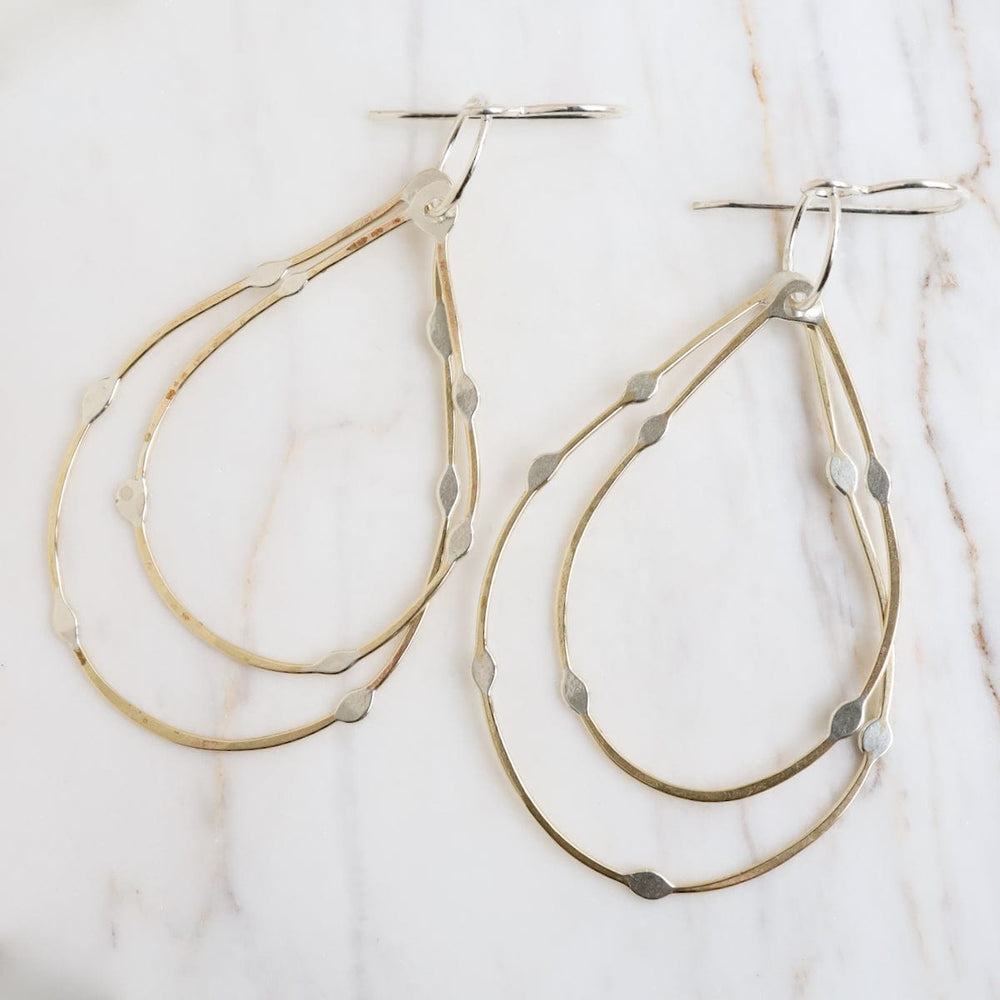 
                      
                        EAR Dotted Teardrop Hoops
                      
                    