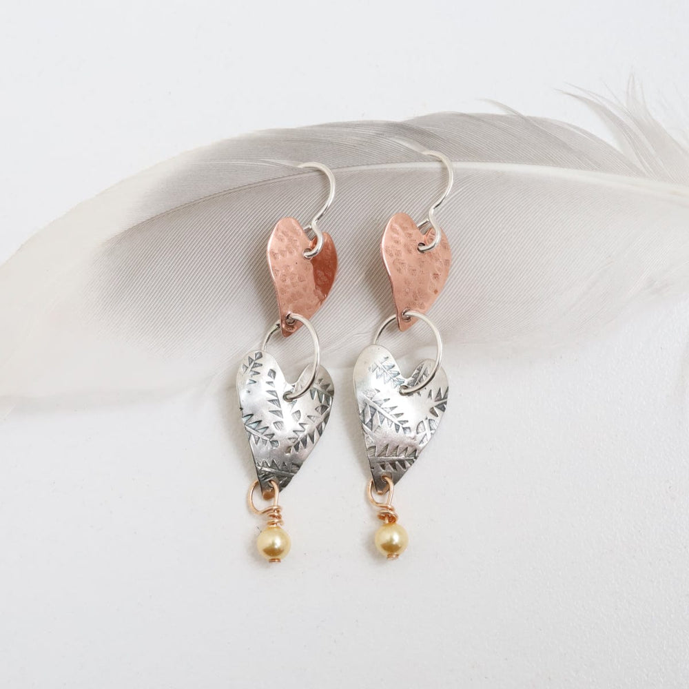 
                      
                        EAR Double Heart Earring With Pearl Earring
                      
                    