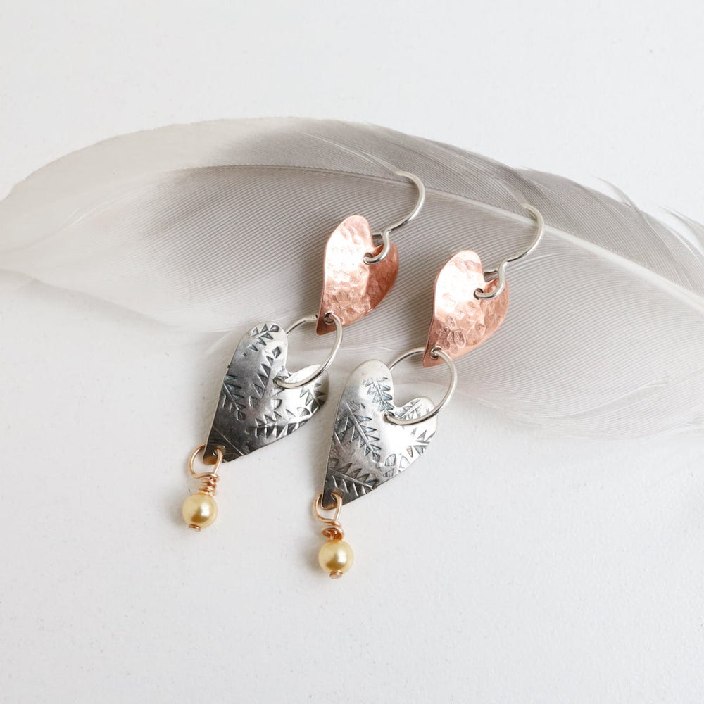 
                      
                        EAR Double Heart Earring With Pearl Earring
                      
                    