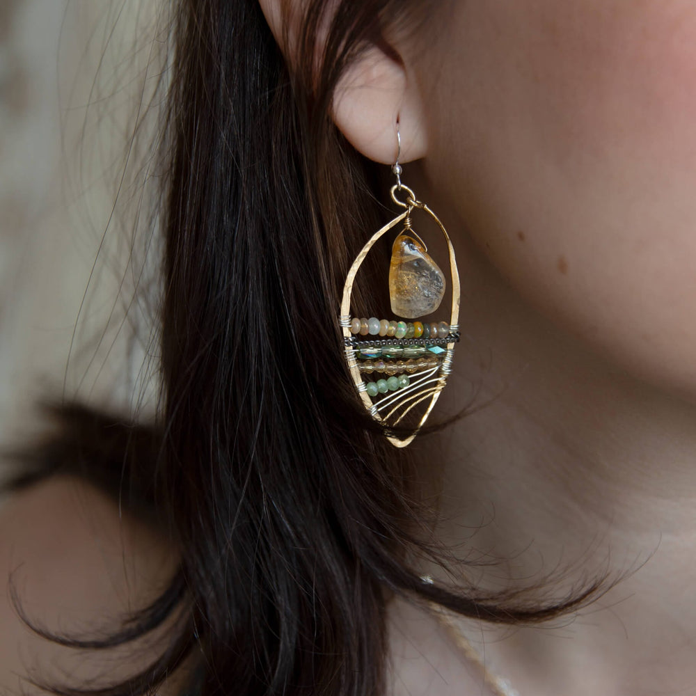 
                  
                    EAR Drop of Sun Earrings
                  
                