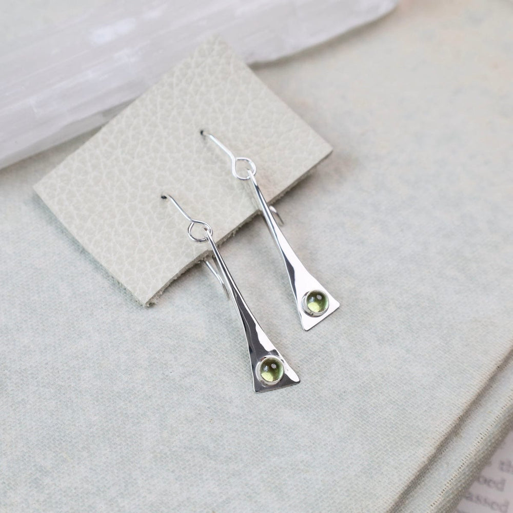 
                      
                        EAR Elongated Triangle Earrings with Peridot Cabachon
                      
                    