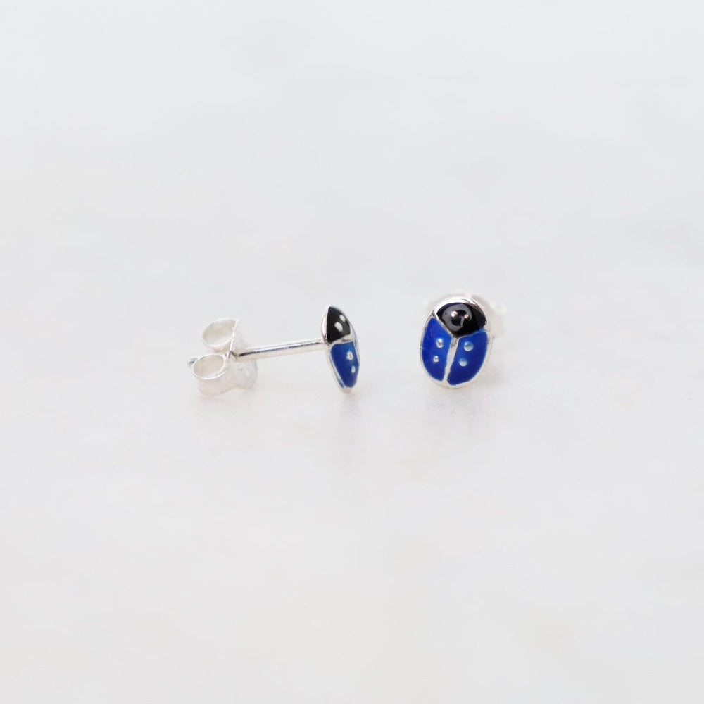 
                      
                        EAR Enamel Ladybug Post Earrings in Dark Blue
                      
                    