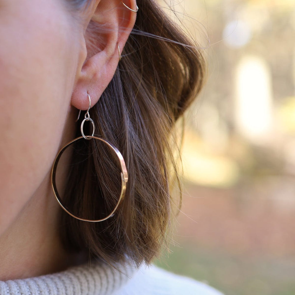 
                      
                        EAR Every Women's Brass Hoops
                      
                    