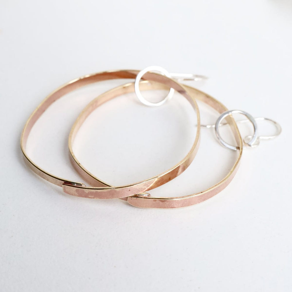 
                      
                        EAR Every Women's Brass Hoops
                      
                    