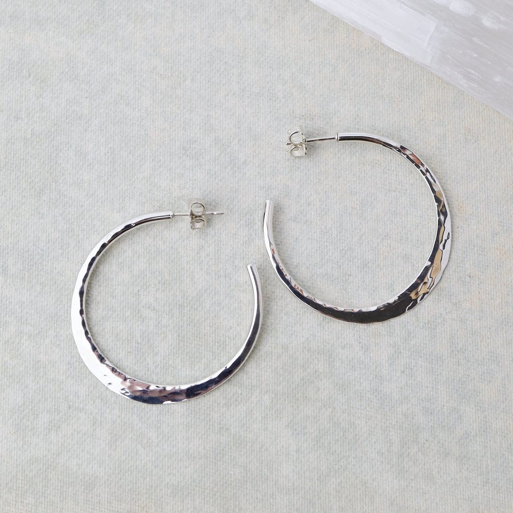 
                      
                        EAR EXTRA LARGE HAMMERED HOOP EARRING
                      
                    