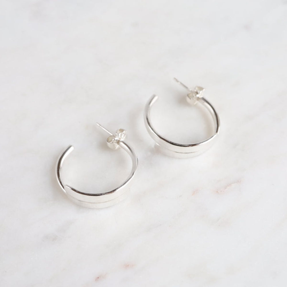 
                      
                        EAR Extra Small Flat Hoop Earring
                      
                    