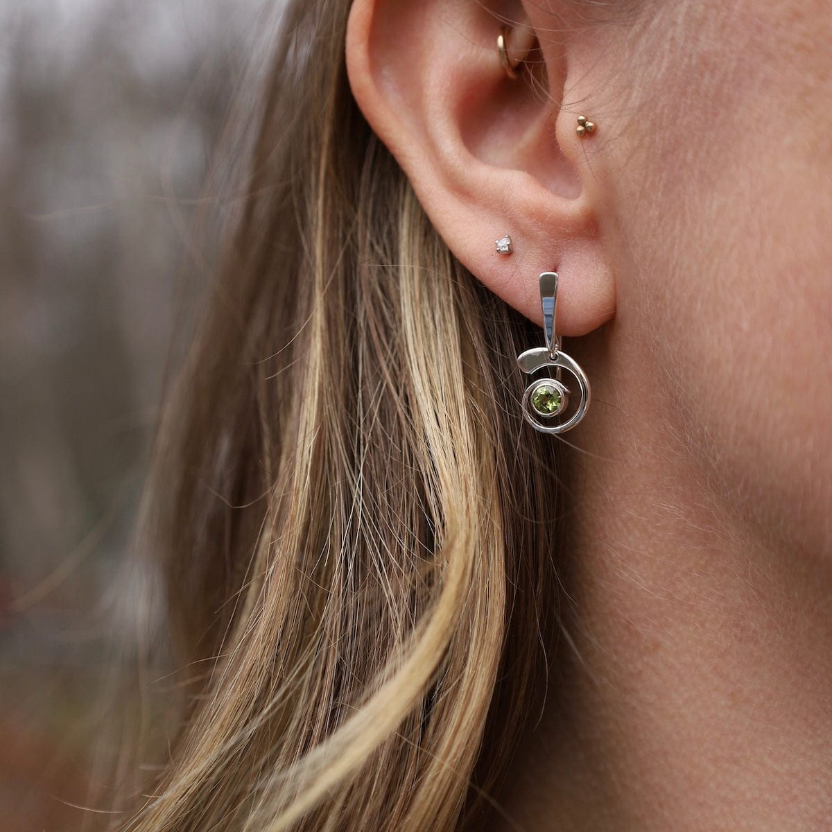 EAR Faceted Peridot Nautilus Earrings