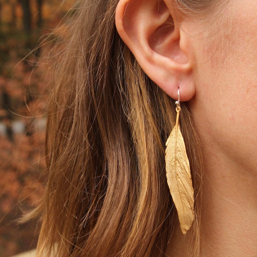 EAR FEATHER GOLD FINISH LINEAR EARRING