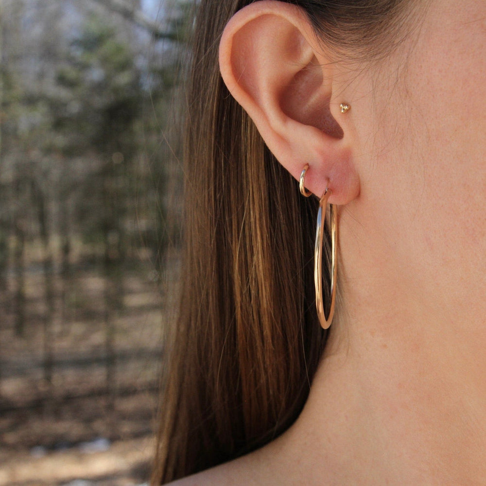 
                      
                        EAR-GF 40mm Hammered Gold Filled Tube Hoop
                      
                    