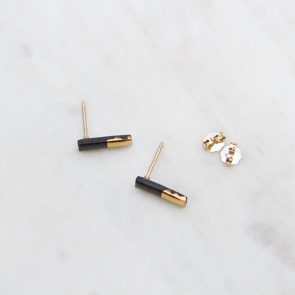 
                      
                        EAR-GF Black Gold Dipped Bar Studs
                      
                    