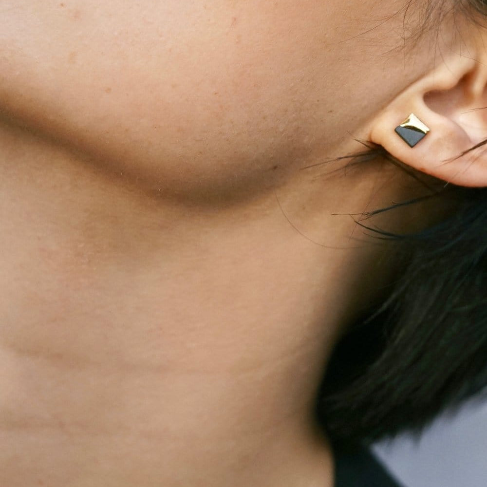 
                  
                    EAR-GF Black Gold Dipped Square Studs
                  
                