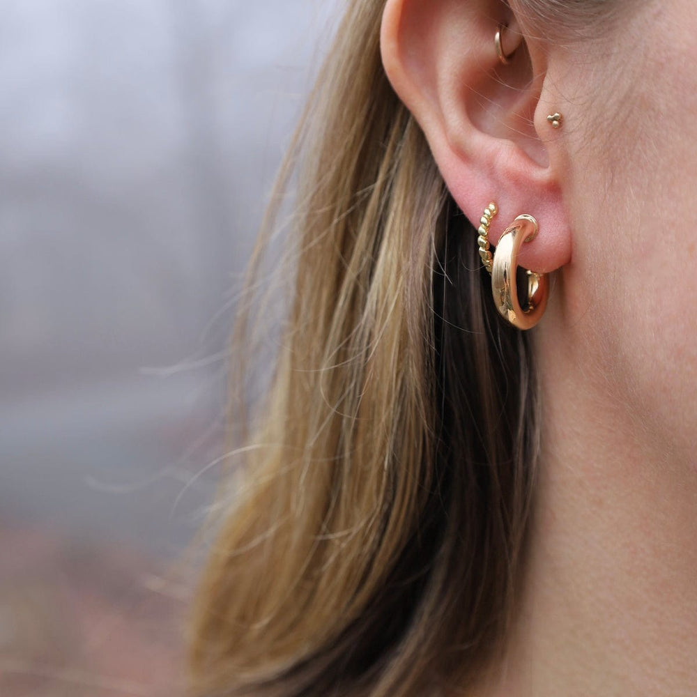 
                      
                        EAR-GF Shoreline Huggie Hoops Gold Filled
                      
                    