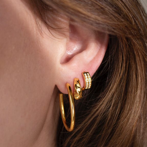 
                      
                        EAR Heather CZ Huggies Gold
                      
                    