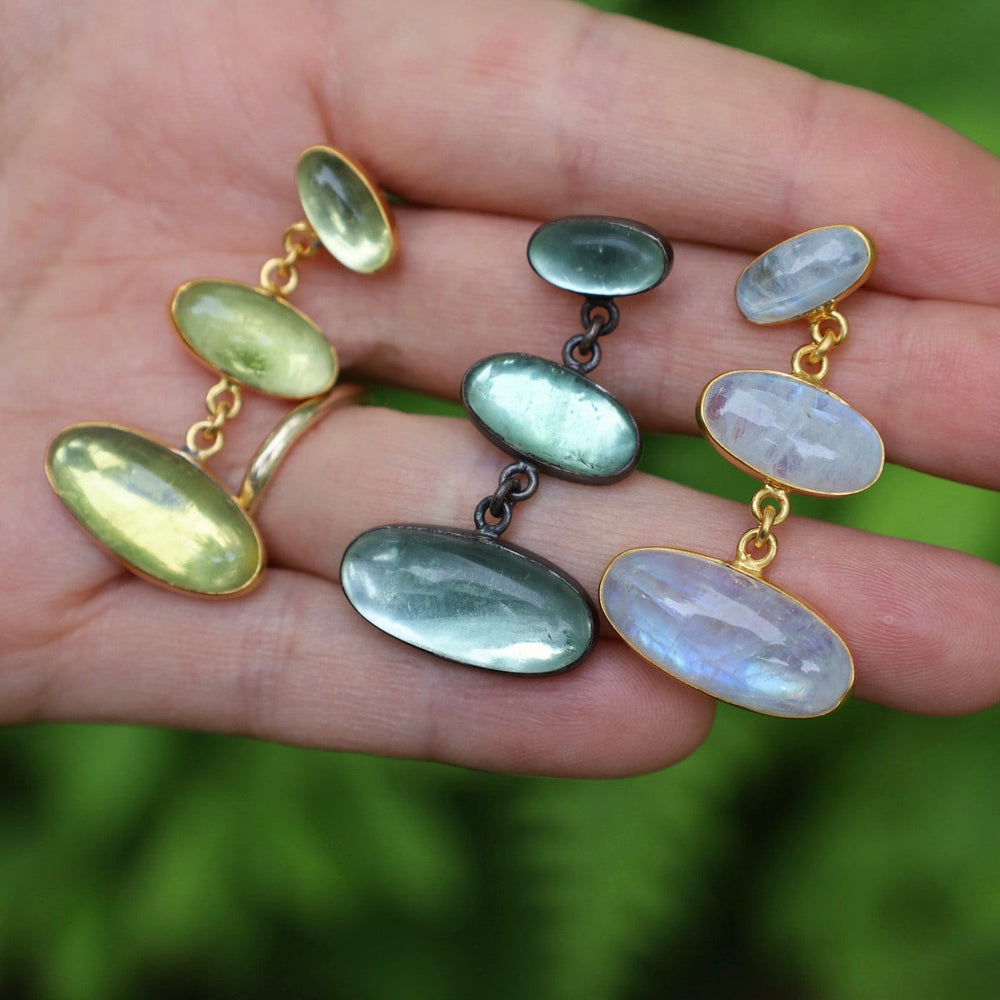 
                      
                        EAR Gold Large Triple Oval Cabochon Rainbow Moonstone Earrings
                      
                    