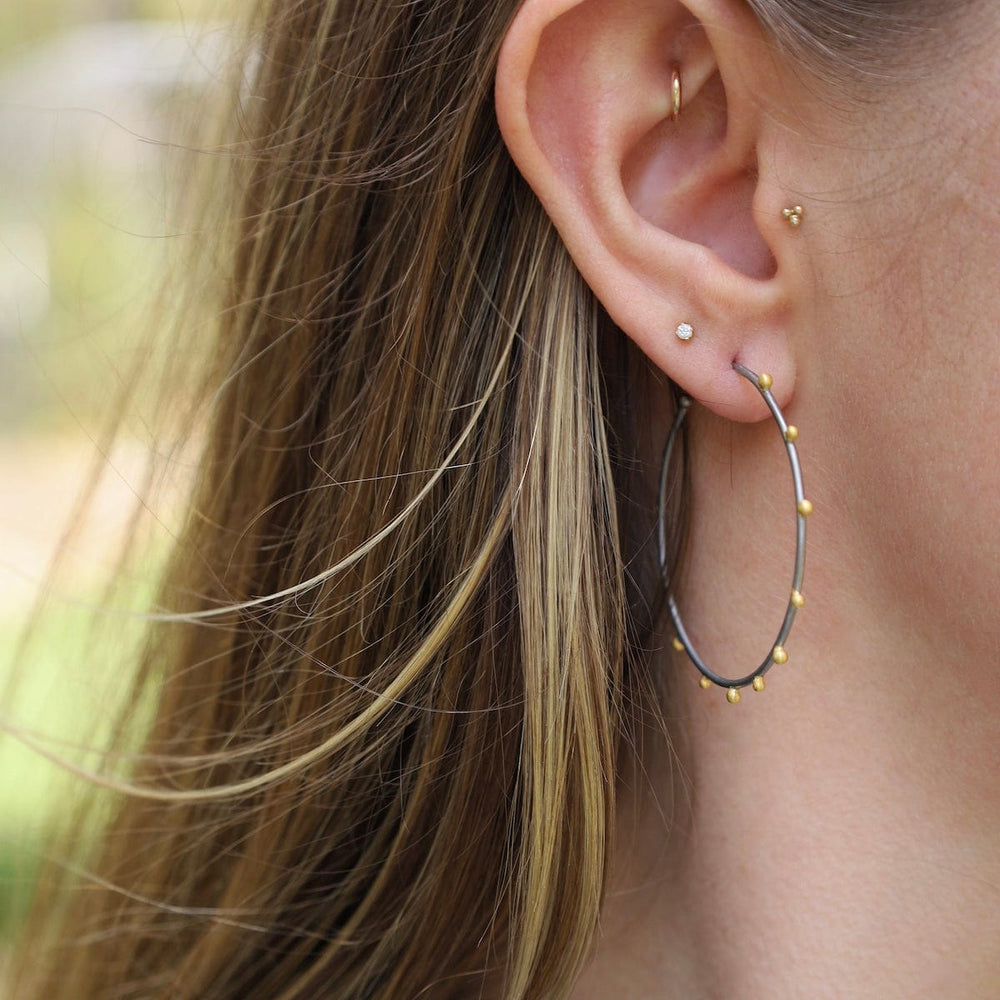 
                      
                        EAR-GPL Dark Rhodium Hoops with Gold Beads
                      
                    